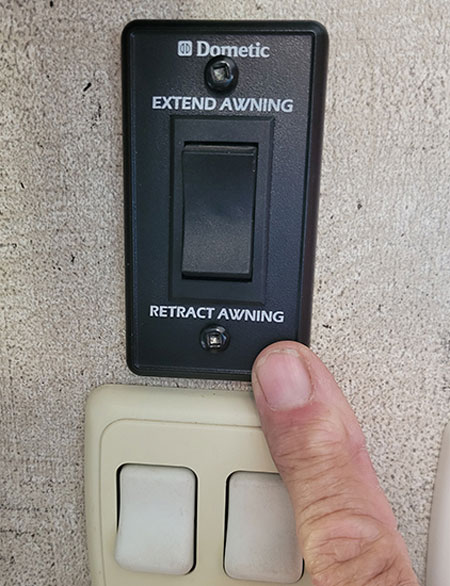 It’s best to incorporate the existing extend/retract switch in the event that the system fails, but it’s not necessary since the remote control handles these functions