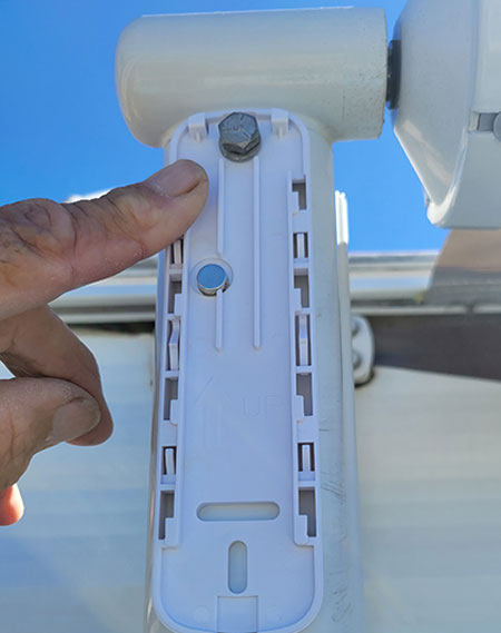 In order to install the awning sensor, the ¼-inch bolt that holds the arm to the roller tube must be removed and utilized to secure the bracket
