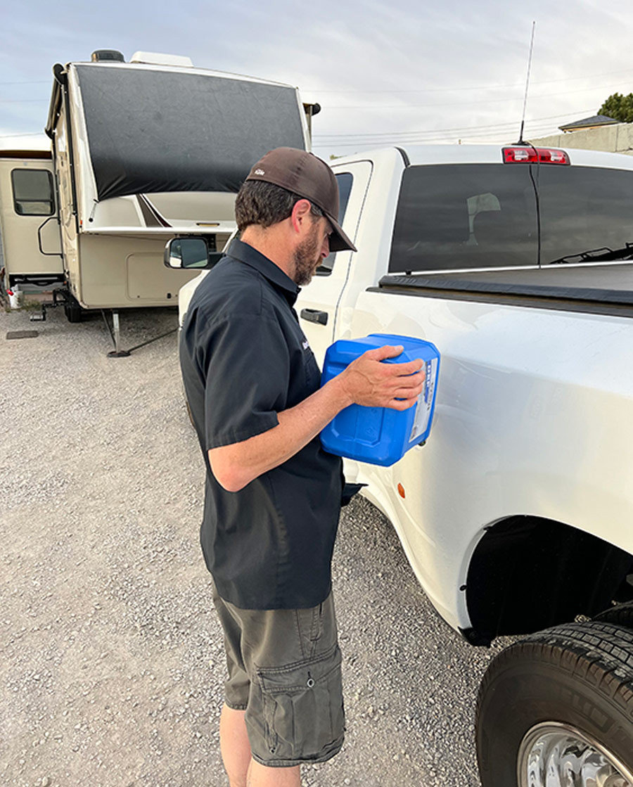 Man fueling his truck