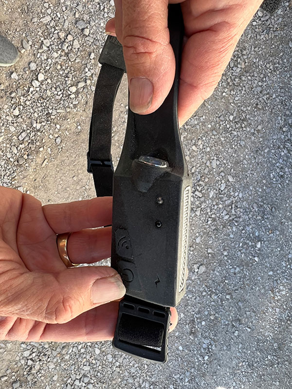 The control box is integrated into the headband and features a secondary spotlight for use in areas where a focused beam is needed (like working on close-up repair projects in dark locations)