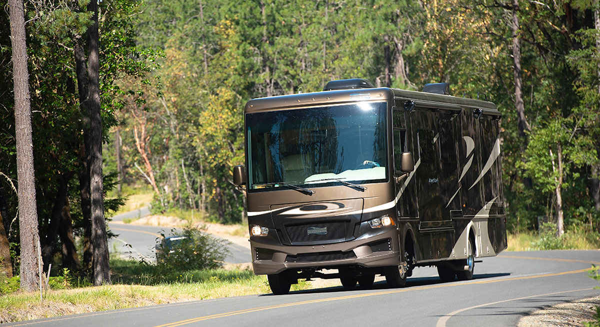 Class A motorhome driving on a road