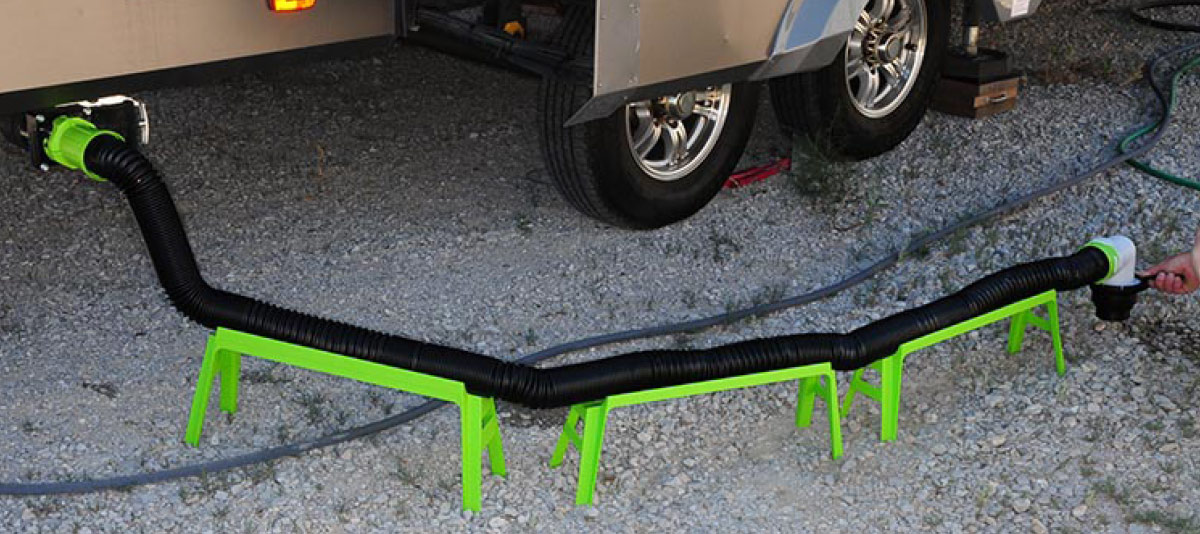 Some RV parks and even states require that the sewer hose be supported