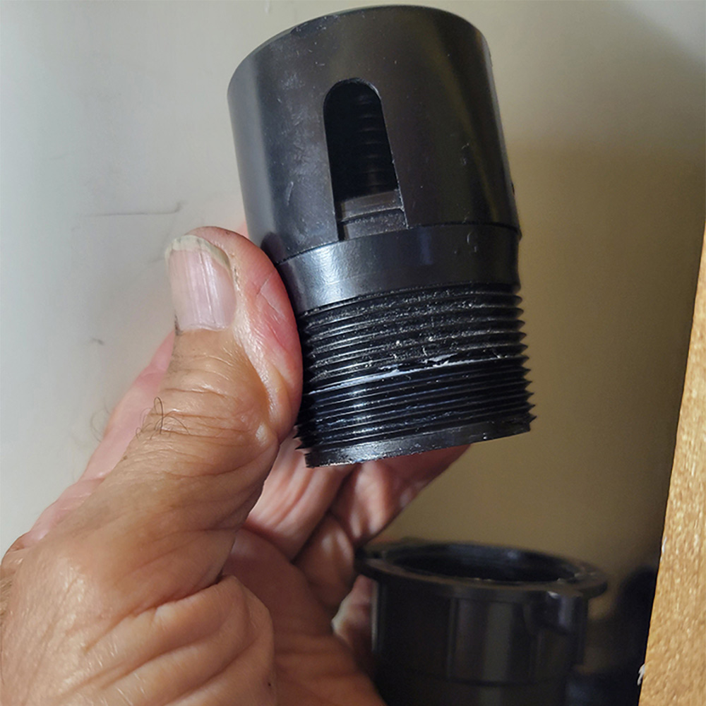 Closeup of old failed check vent