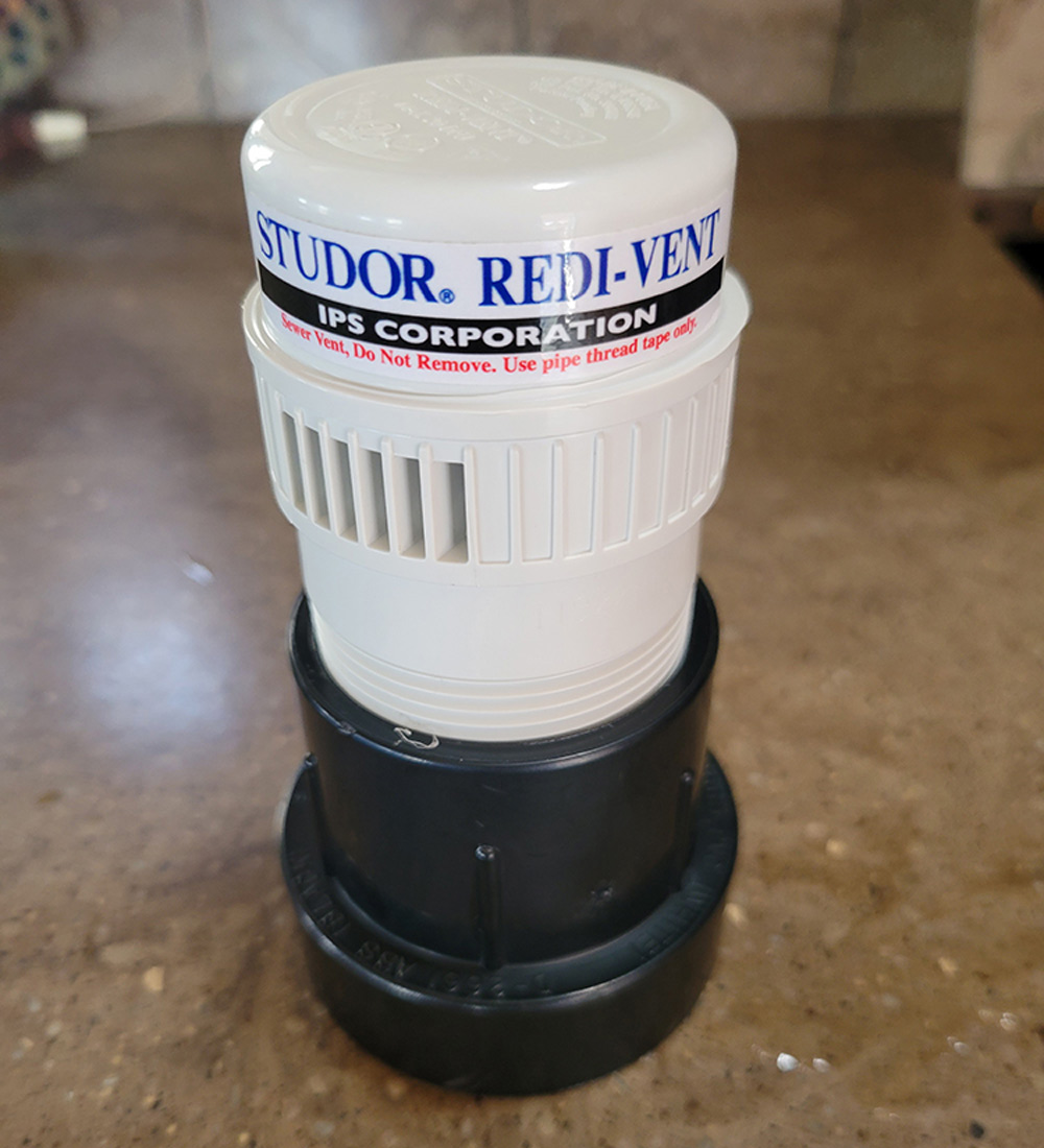 New check vent screwed into adaptor