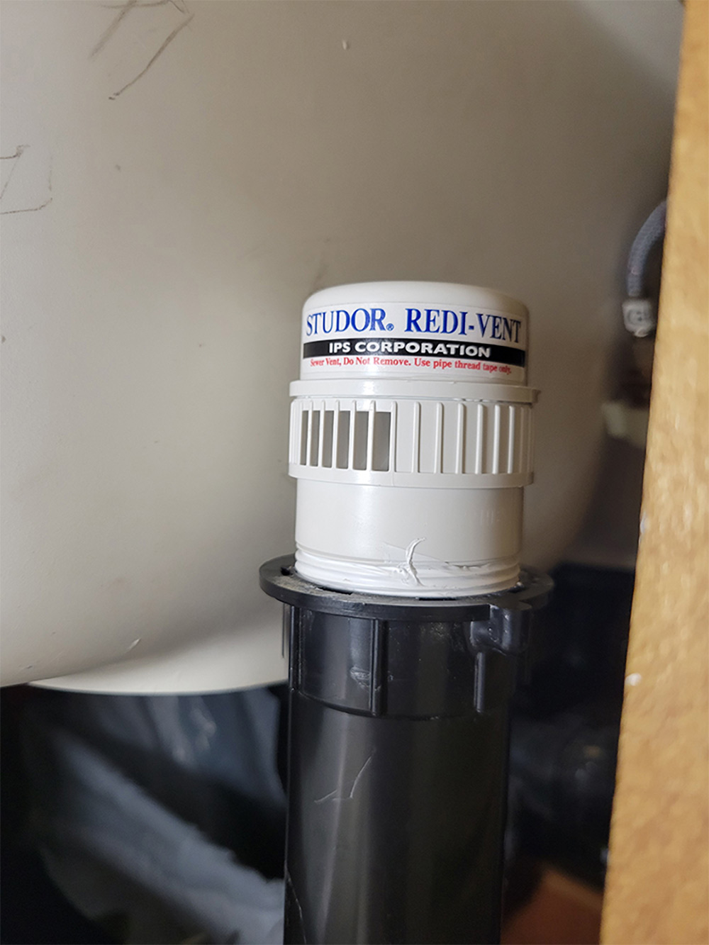 New check vent secured into pipe