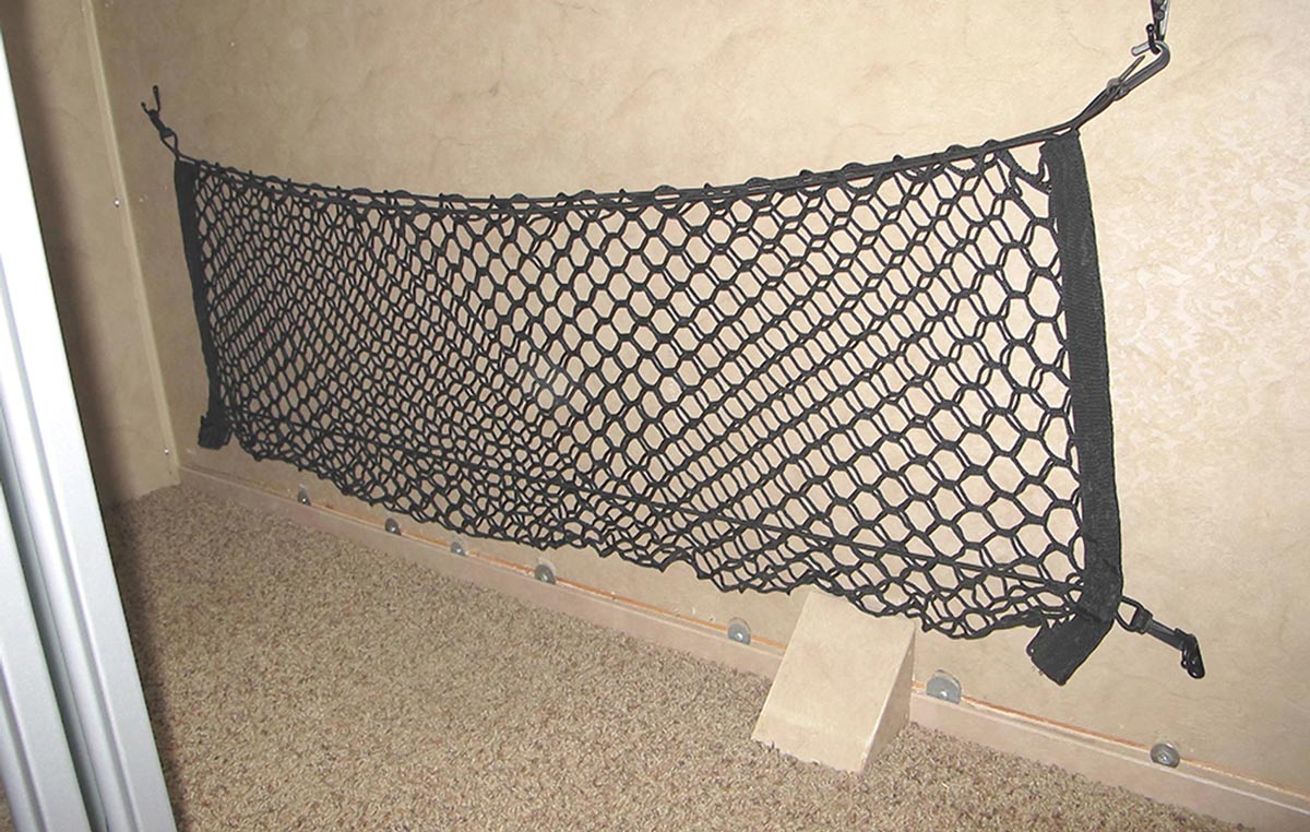 full view of the newly installed cargo net, just above the floor