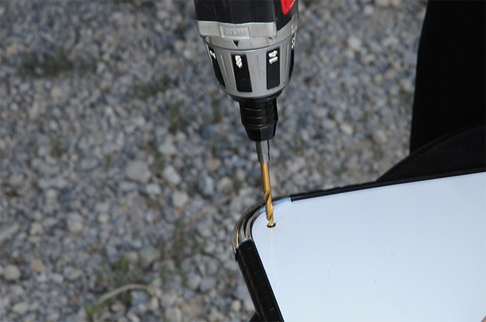 Drilling holes in whiteboard corner