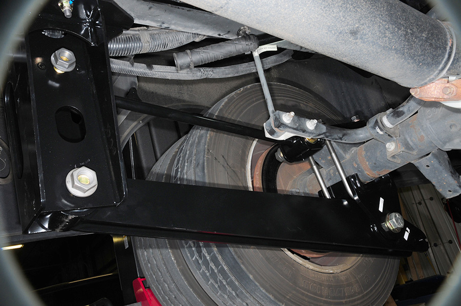 Brackets to accept control arms and strut