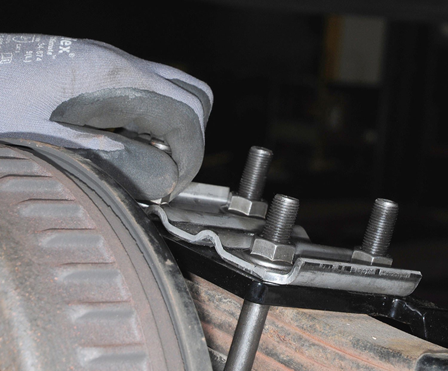 the U-bolt is initially hand tightened