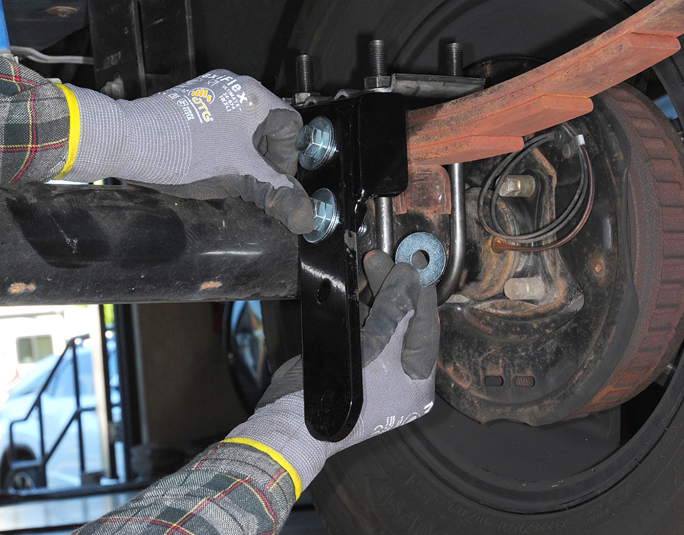an extension plate is attached to one of the new tie plates