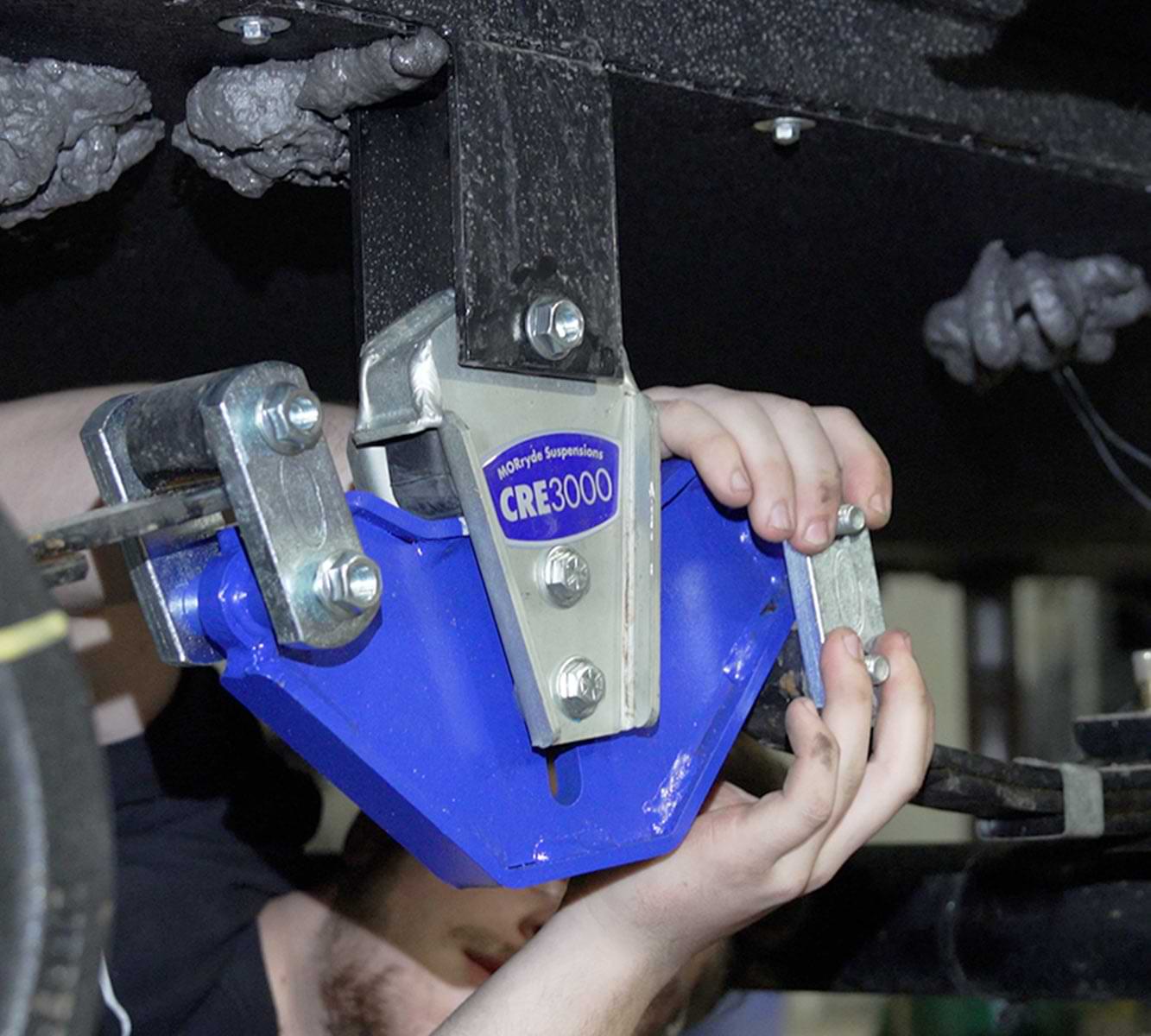 using the MORryde replacement heavy-duty shackles, the leaf spring packs are reattached to the CRE3000 equalizer