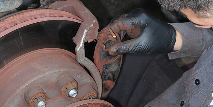The rotor and hub assembly were replaced, and the brake calipers and pads were reassembled