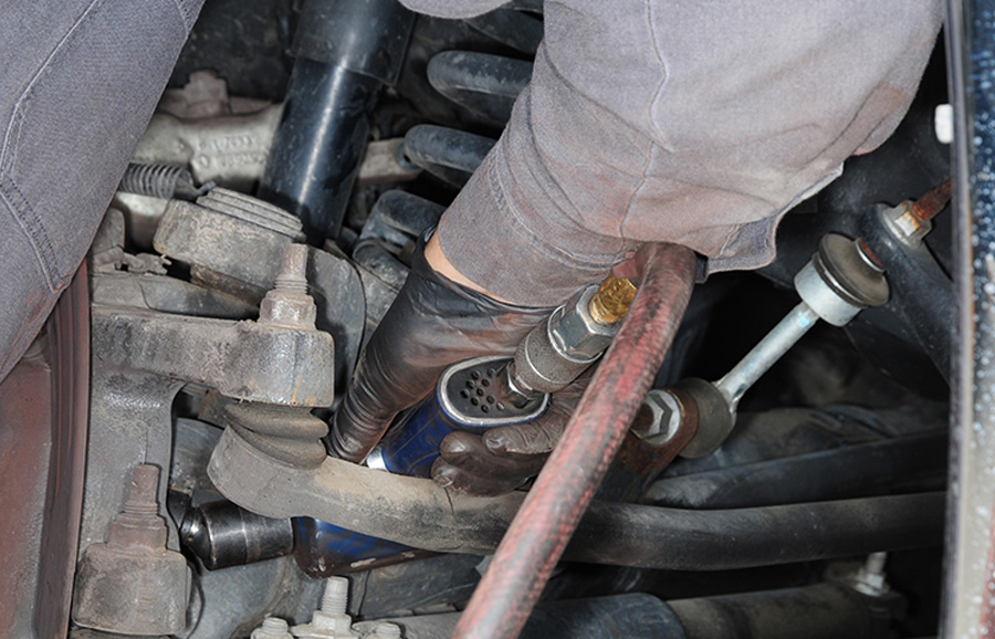 There are four bolts that were removed from the backside of the bearing assembly