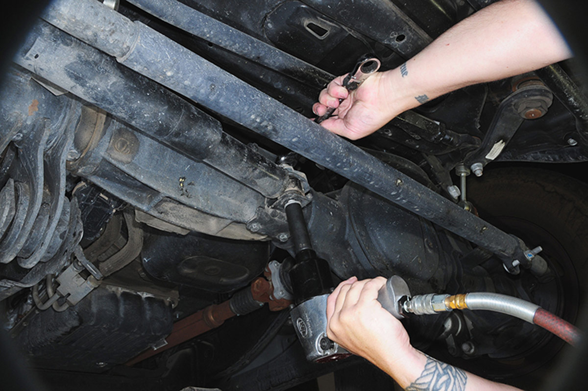 bolt that holds the factory damper to axle bracket was removed