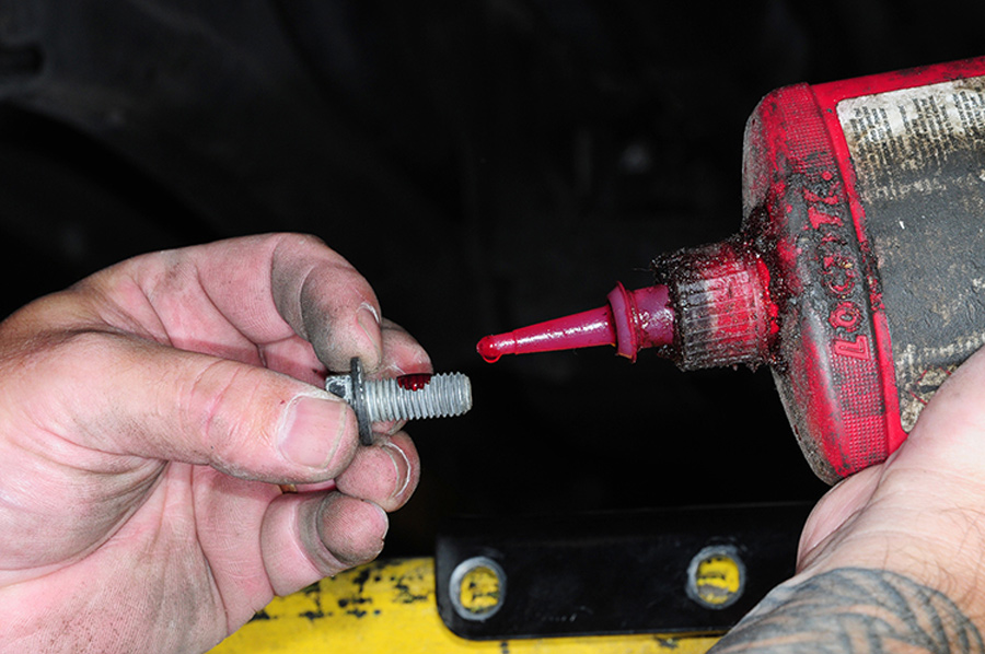 coating axle-bracket bolts with thread sealer