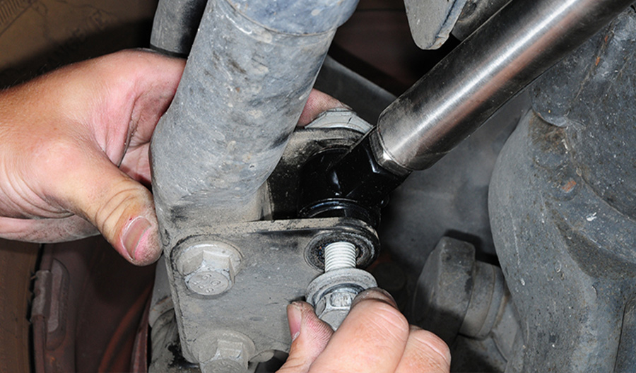 bolt, washers and nut reinstalled in the tie-rod bracket