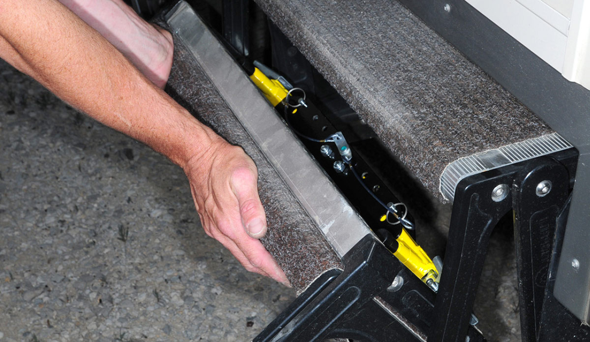 When the legs are folded and pinned in place, the steps can be retracted for travel with no clearance issues