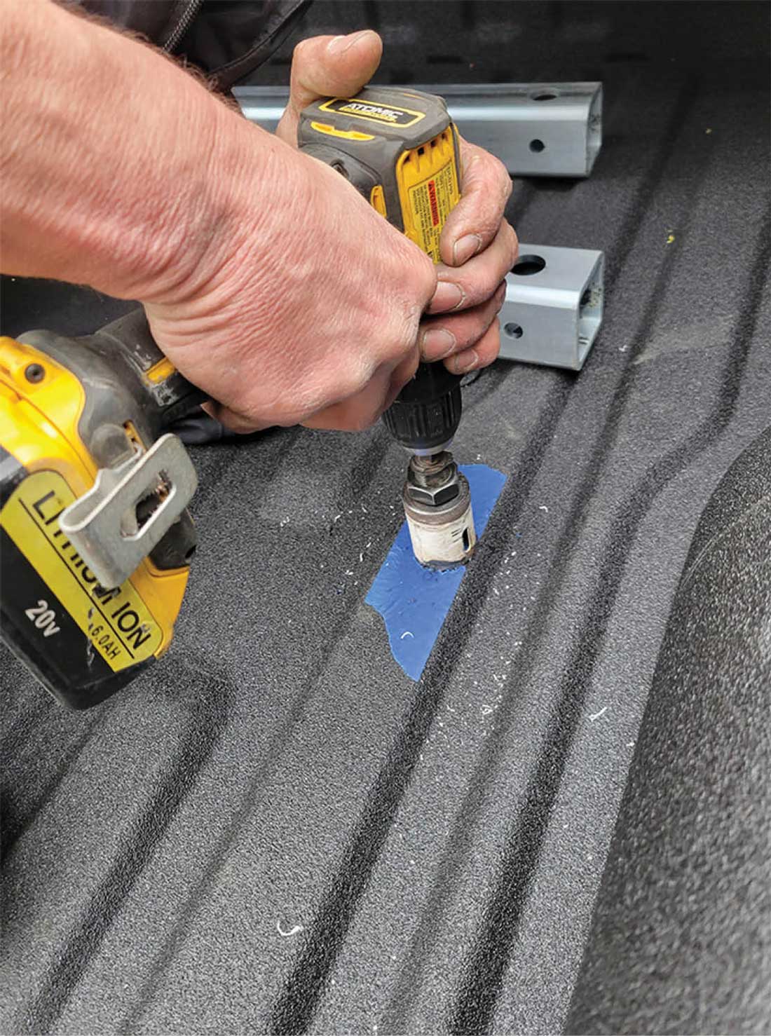 Drilling final holes in bed