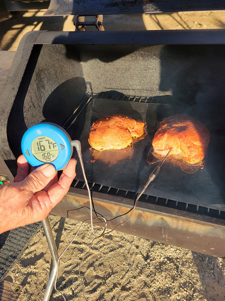 thermoworks thermometer measuring meats inside smoker