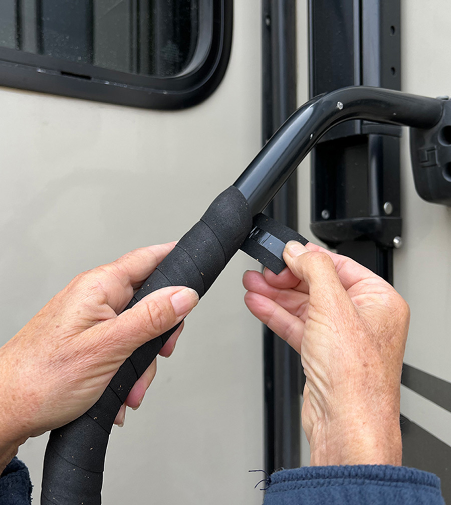 wrapping the tape around the metal until it runs out