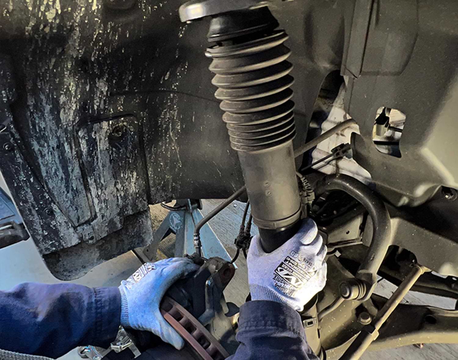 the old strut lifts out easily of its home in the Sprinter chassis