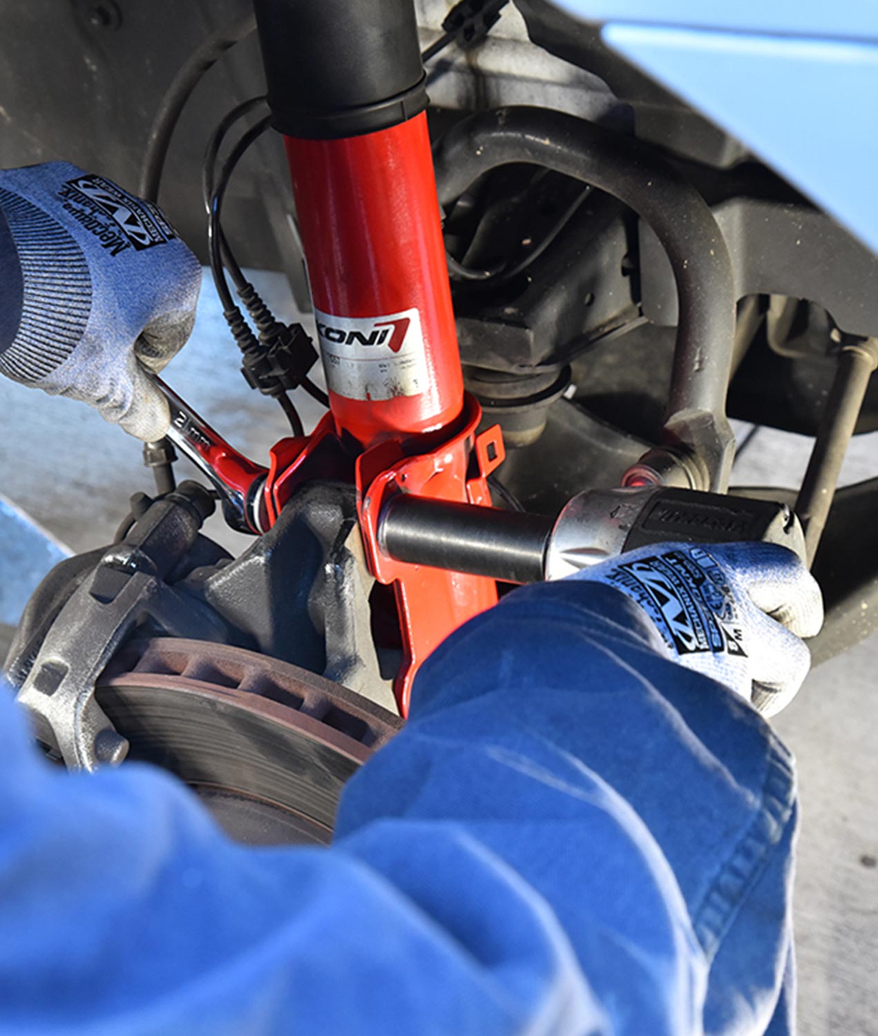 with the strut in position, the two lower bolts are tightened