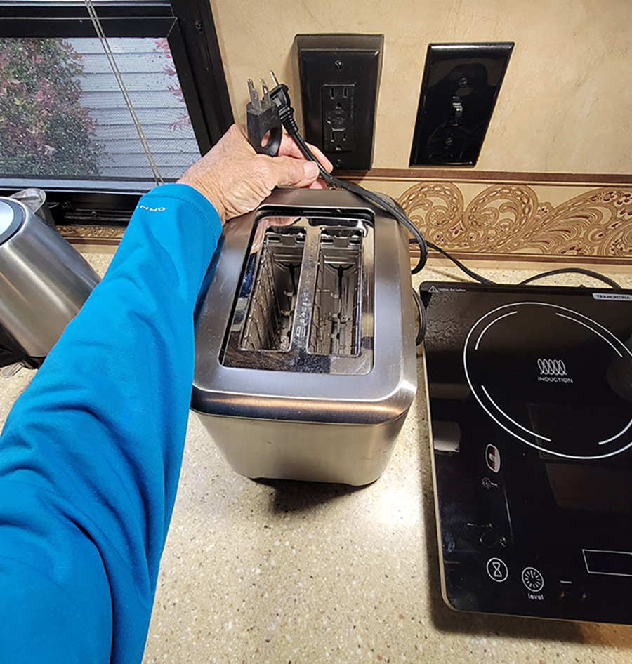 A picture of a toaster on a counter