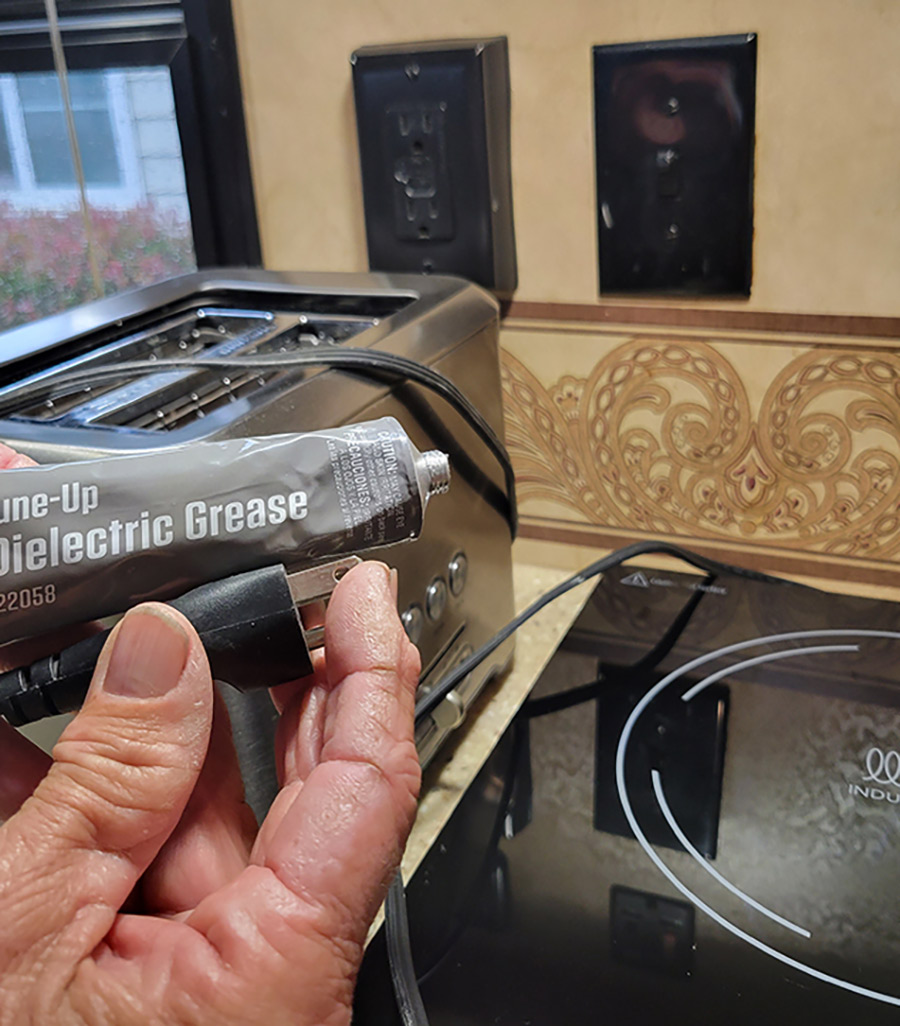 A bottle of grease used  for appliances