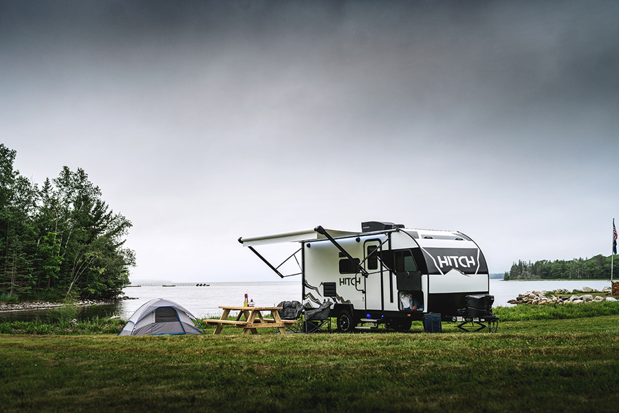 RV out on a gloomy morning by a lake