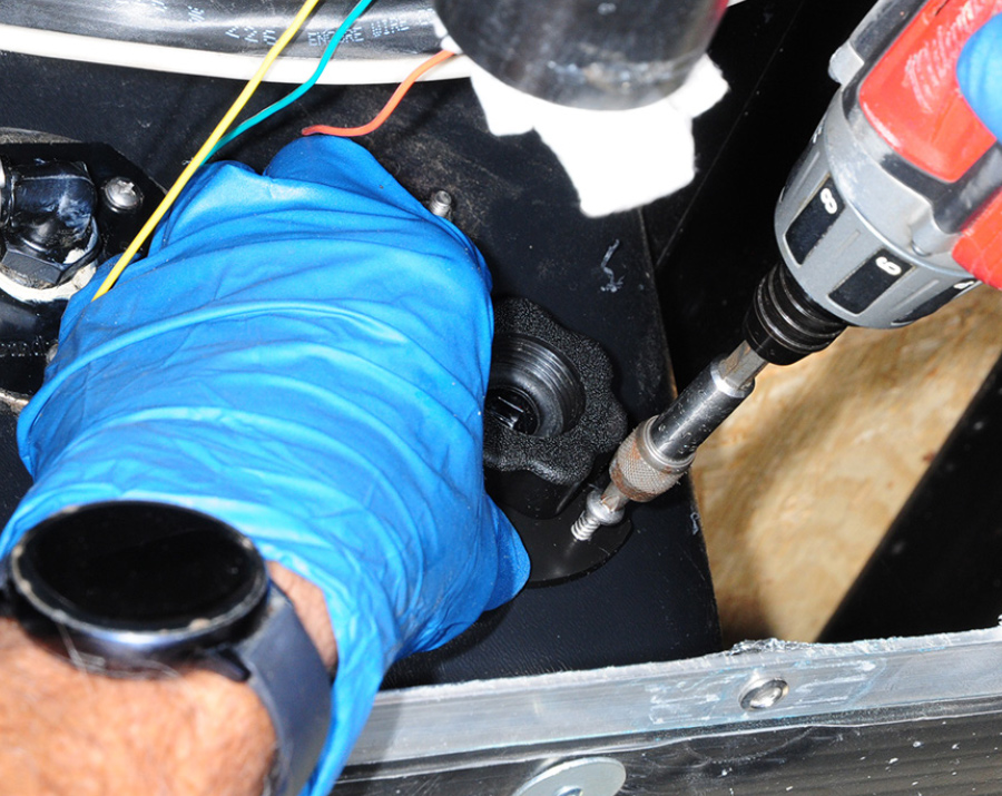 screws driven into the tank to establish positioning