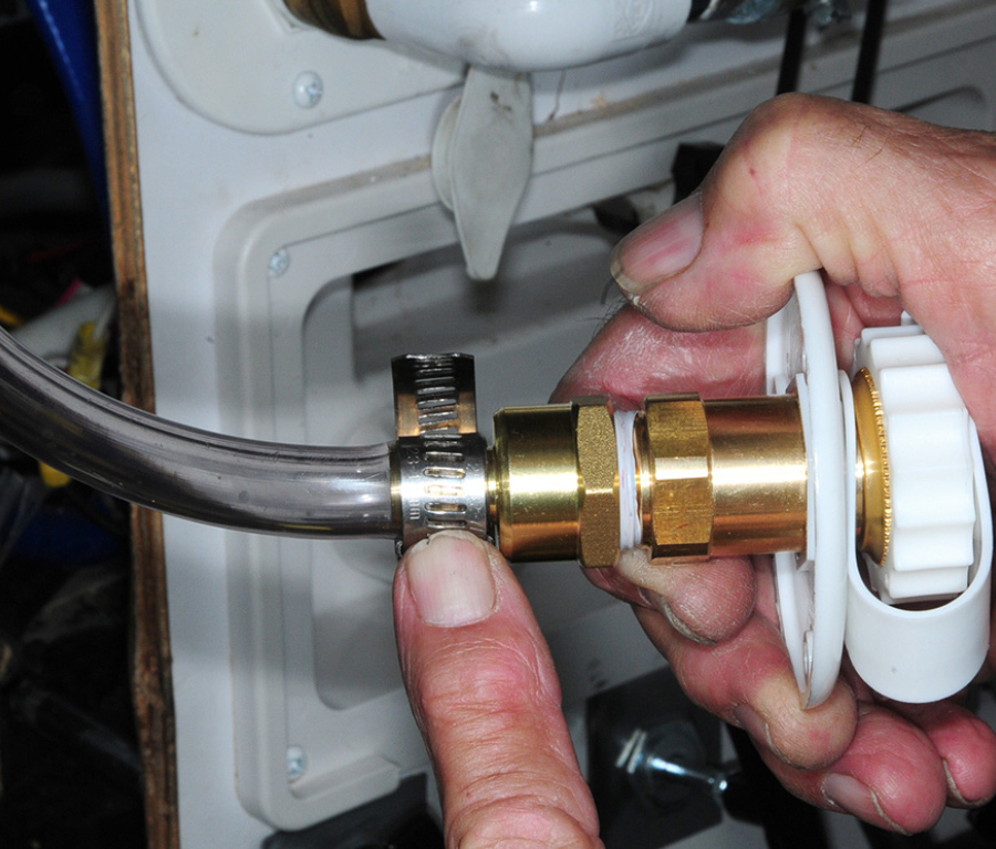 cut end of the hose that was routed from the spray head