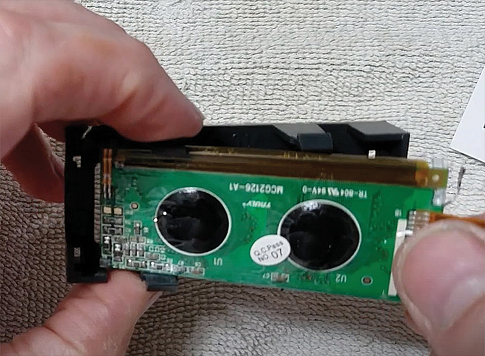Removing old LCD from plastic bezel