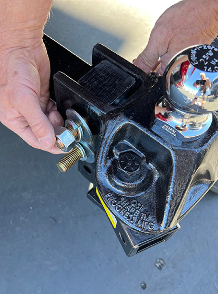 Two ¾-inch bolts, along with the flat washers, lock washers and nuts, are used to mount the hitch head to the shank