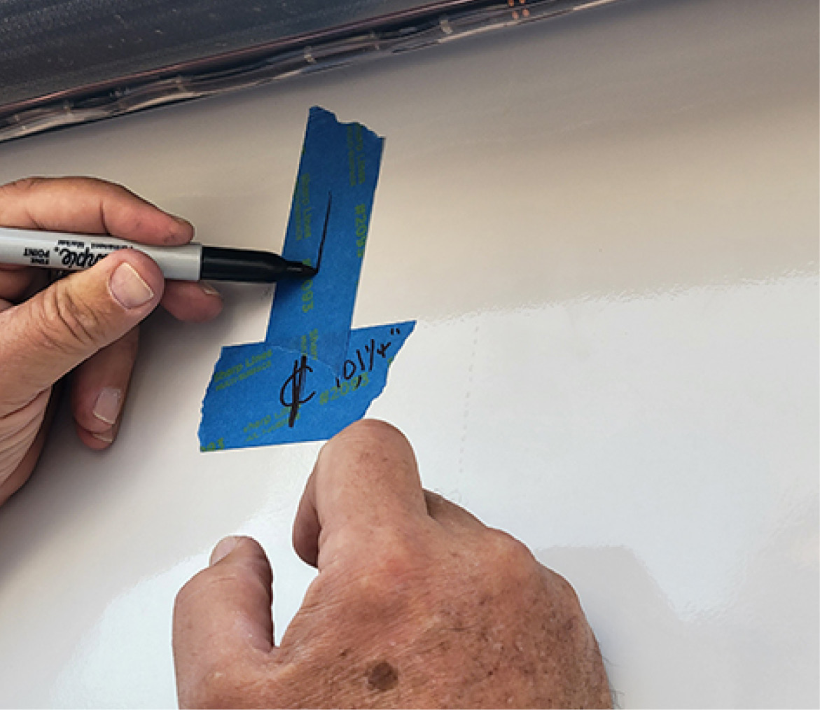 Once the center point is established, painter’s tape was used to mark the proper location of the cradle assembly.