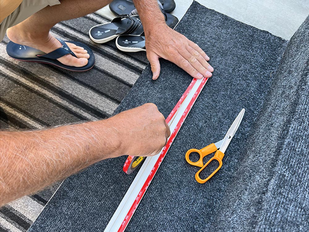 Applying VHB tape to underside of molding