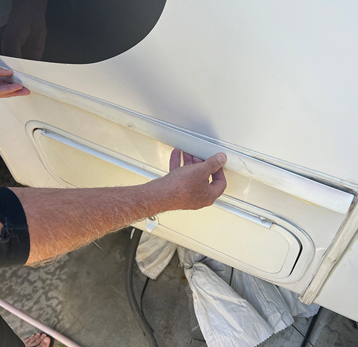 Sidewall transition seam molding on fifth-wheel beginning to fall off 