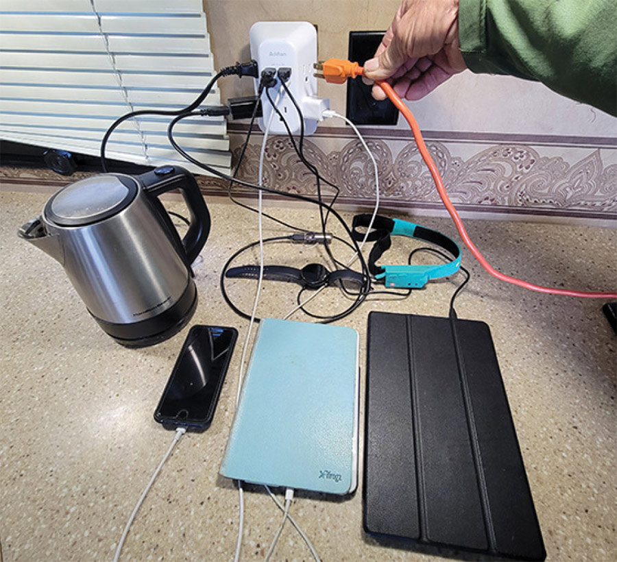 Multiple devices being charged at once using USB wall adapter