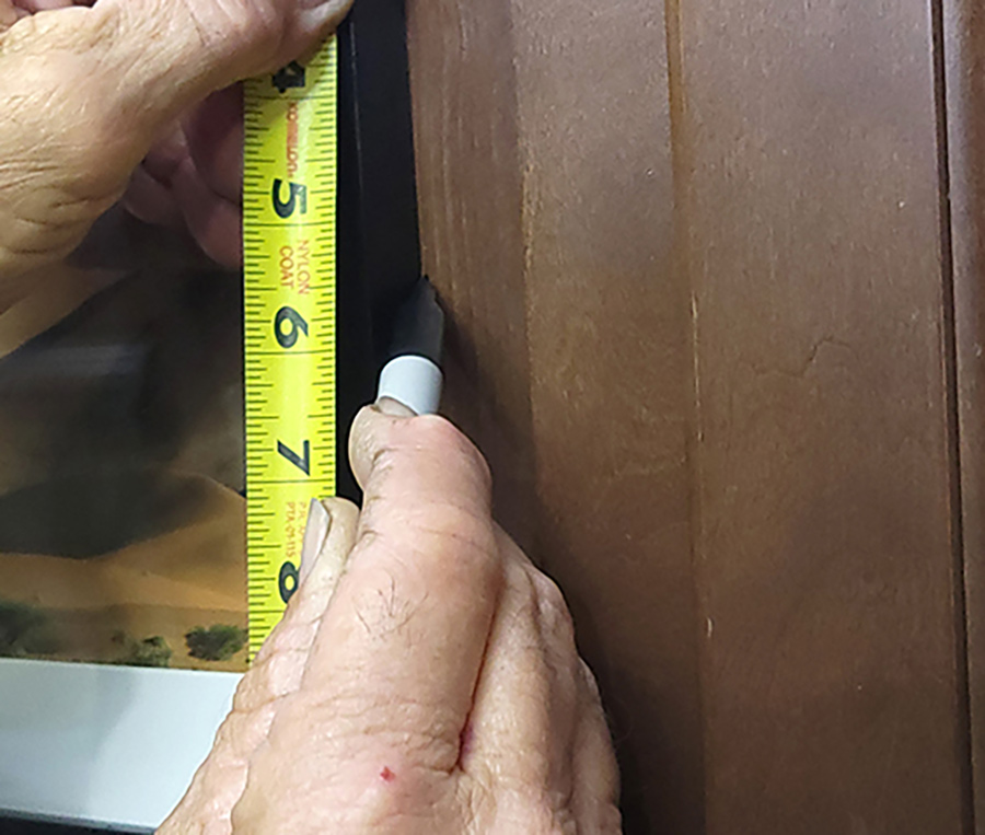 One magnetic catch was needed to keep the picture frame closed. These catches are available on Amazon (“Cabinet Door Magnets Jiayi 6 pack,” $10.99). They can be attached with the enclosed screws or two-face tape; screws were used here.