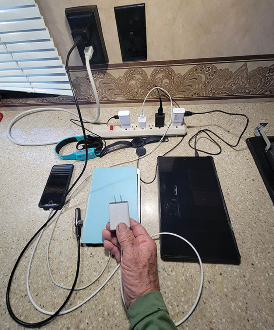 surge protector with multiple devices plugged into it