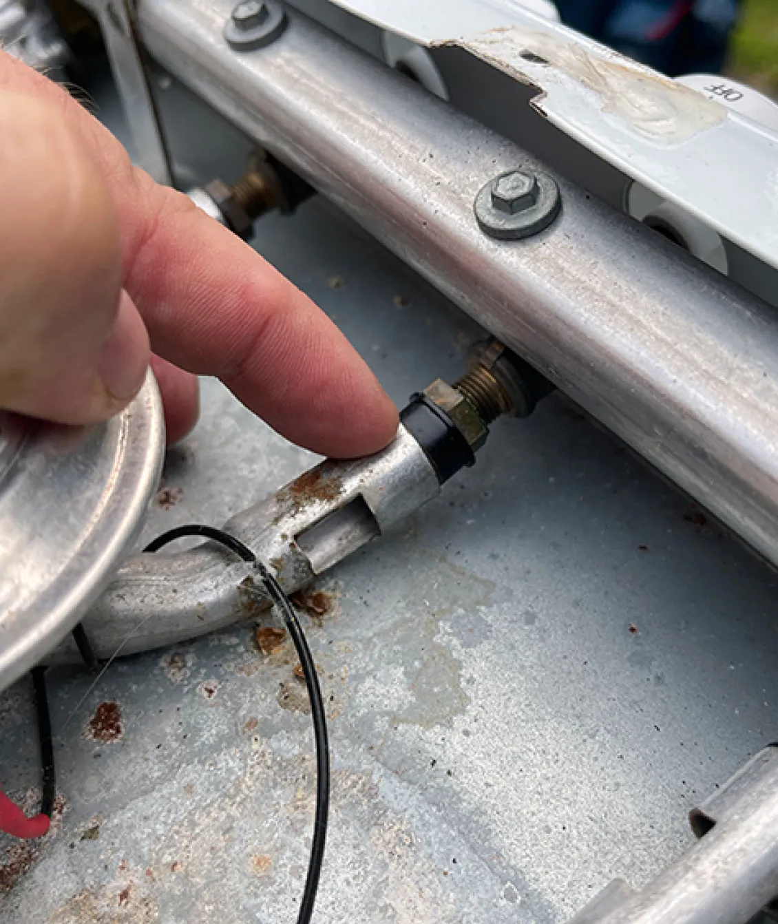 If you remove the burners for cleaning, don’t lose the burner bushing! It slides off the valve easily.