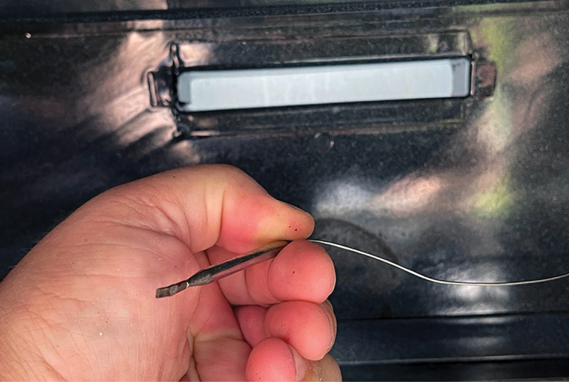 The oven temperature bulb should also be clean. In this case, it was sitting on the floor of the oven; the bracket for the bulb, which goes in the hole in the back, was missing. Obviously, this affected oven performance.