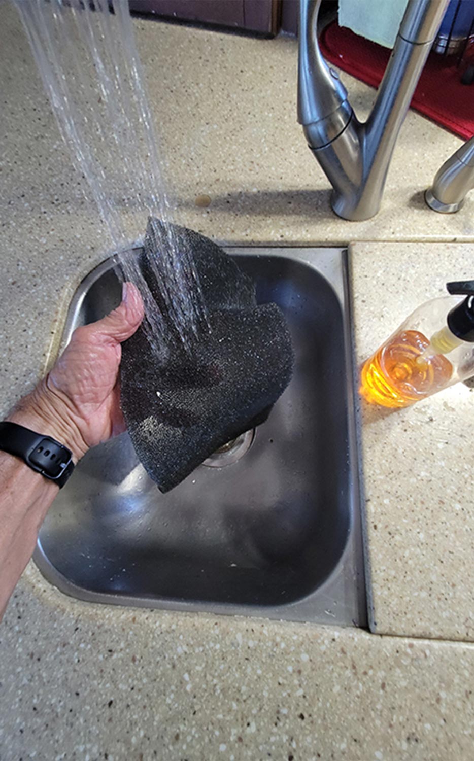 the return-air filter is washed in an RV sink with soap and water