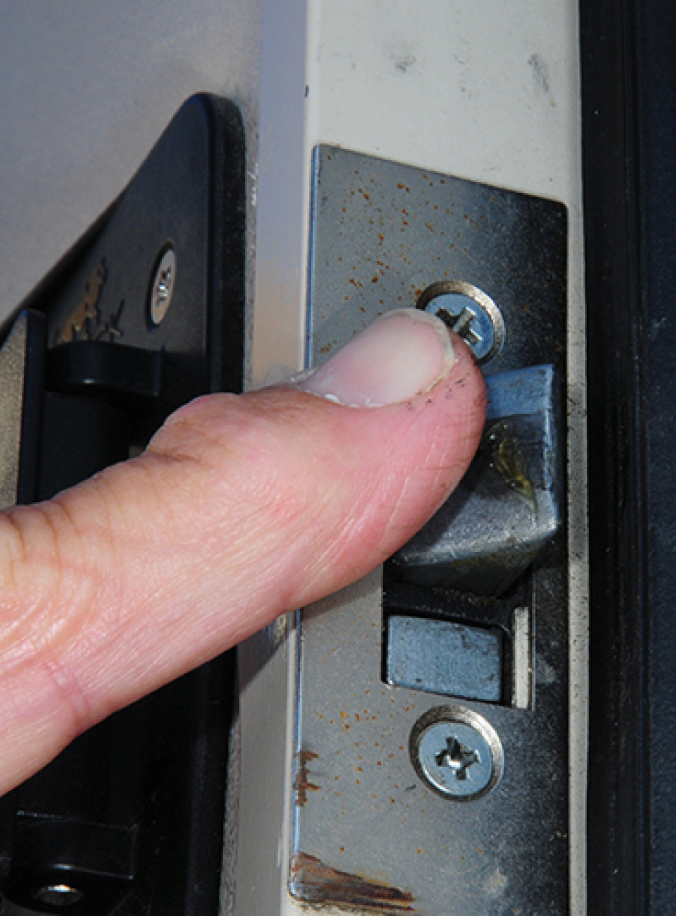 Coating latch bolt with Sil-Glyde