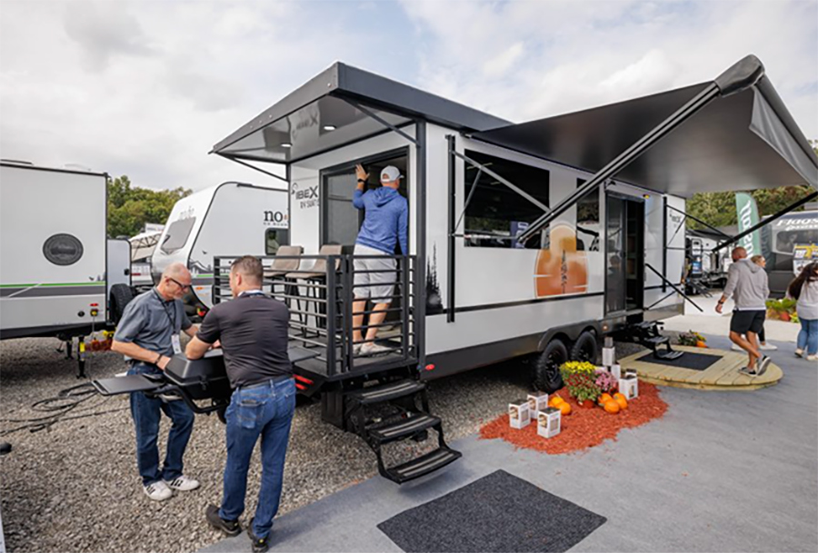 A group of people hanging around The RV Suite