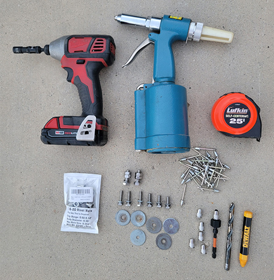 various hand tools laid out on a table