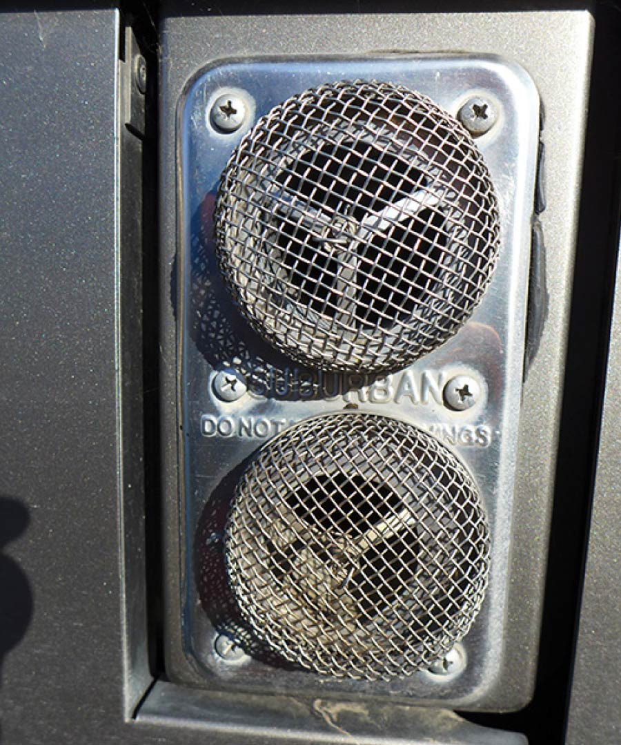 intake and exhaust ports covered with screens