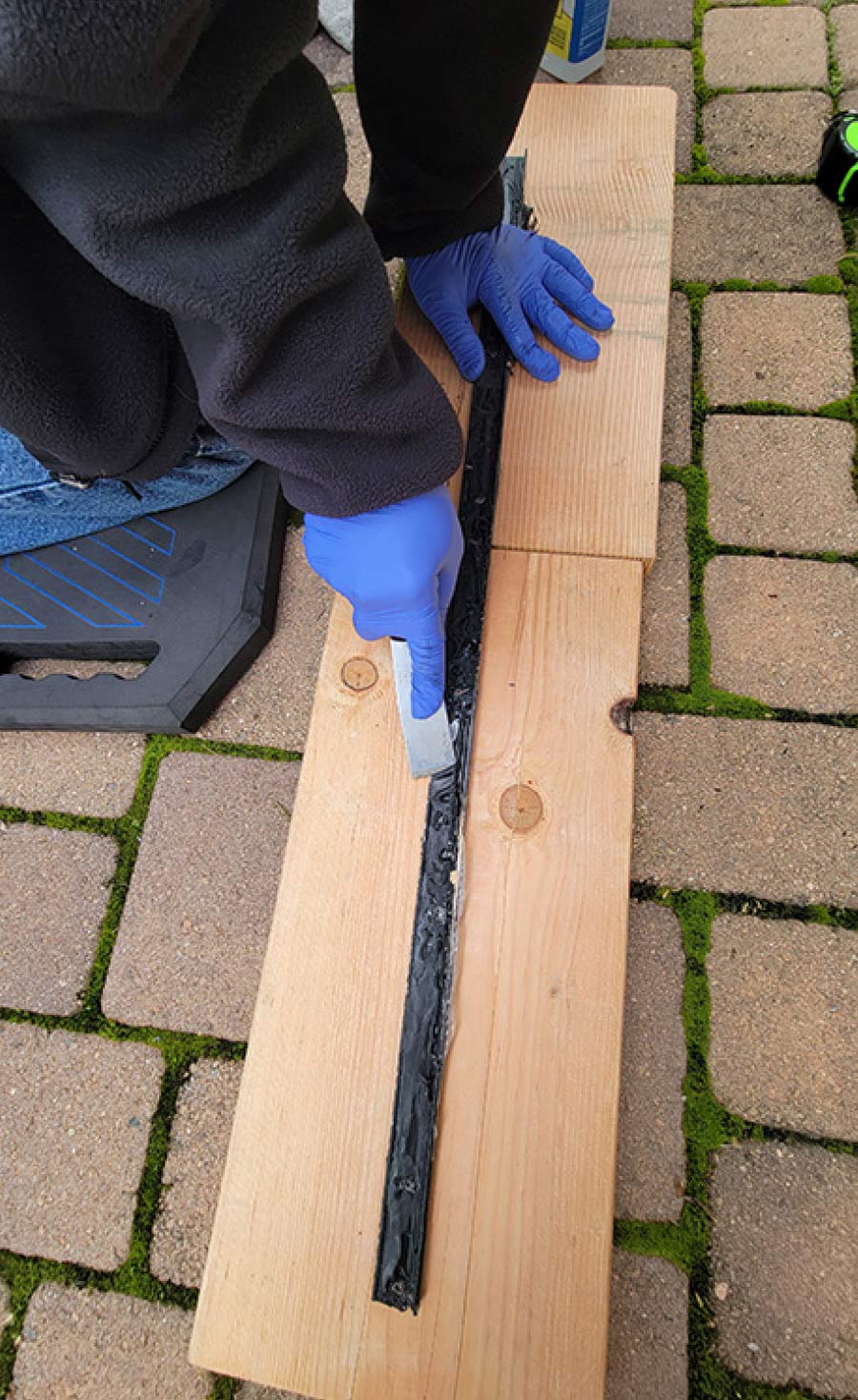 old putty being cleaned off from the molding