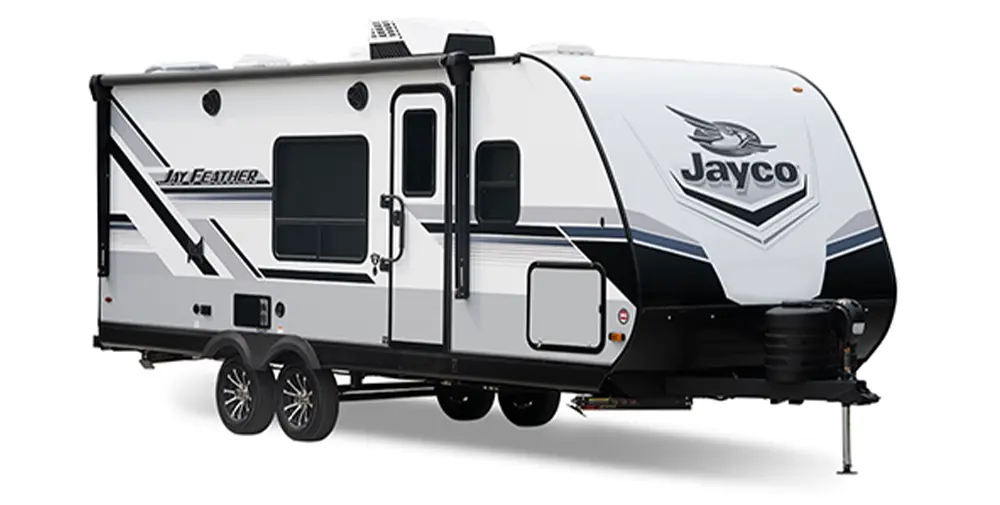 quarter view of a 2024 Jayco Jay Feather in white and with grey, blue and black graphics