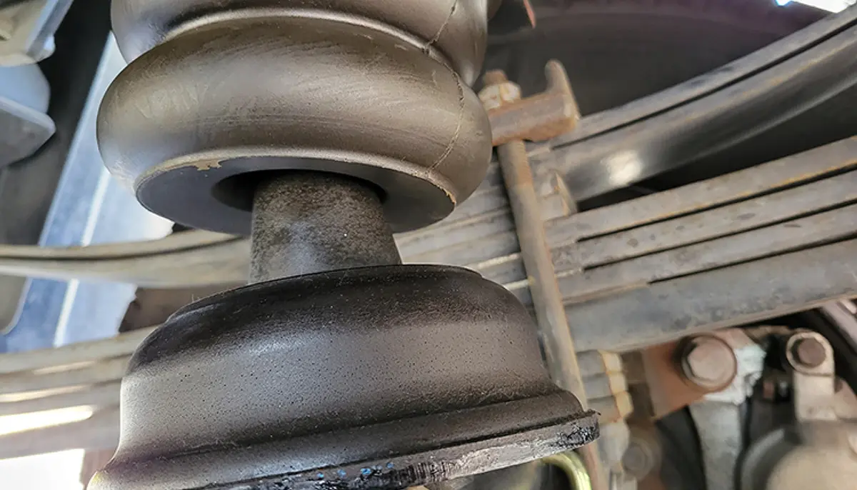  bottom spring section was rotated on the axle housing until the cone fit perfectly into the top half of the spring