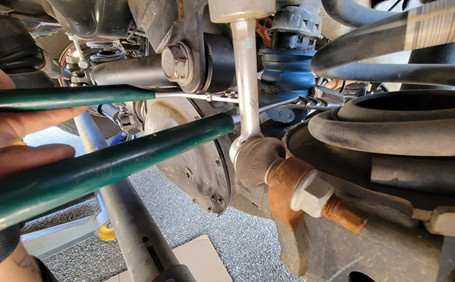 large offset pliers used to hold the SumoSpring base